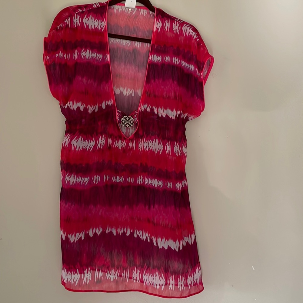 Beautiful Becca short sleeve coverup with deep v finished with gold medallion